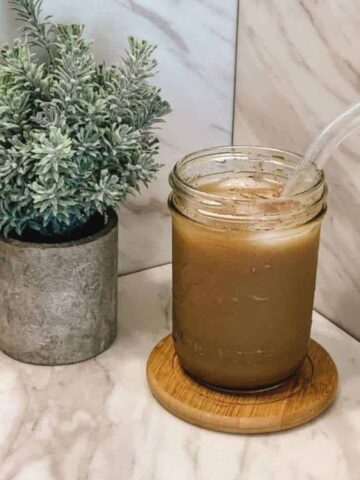 Homemade Starbucks brown sugar oat milk shaken espresso recipe in a mason jar.